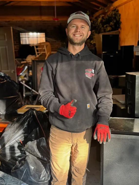 Person in work attire giving thumbs up