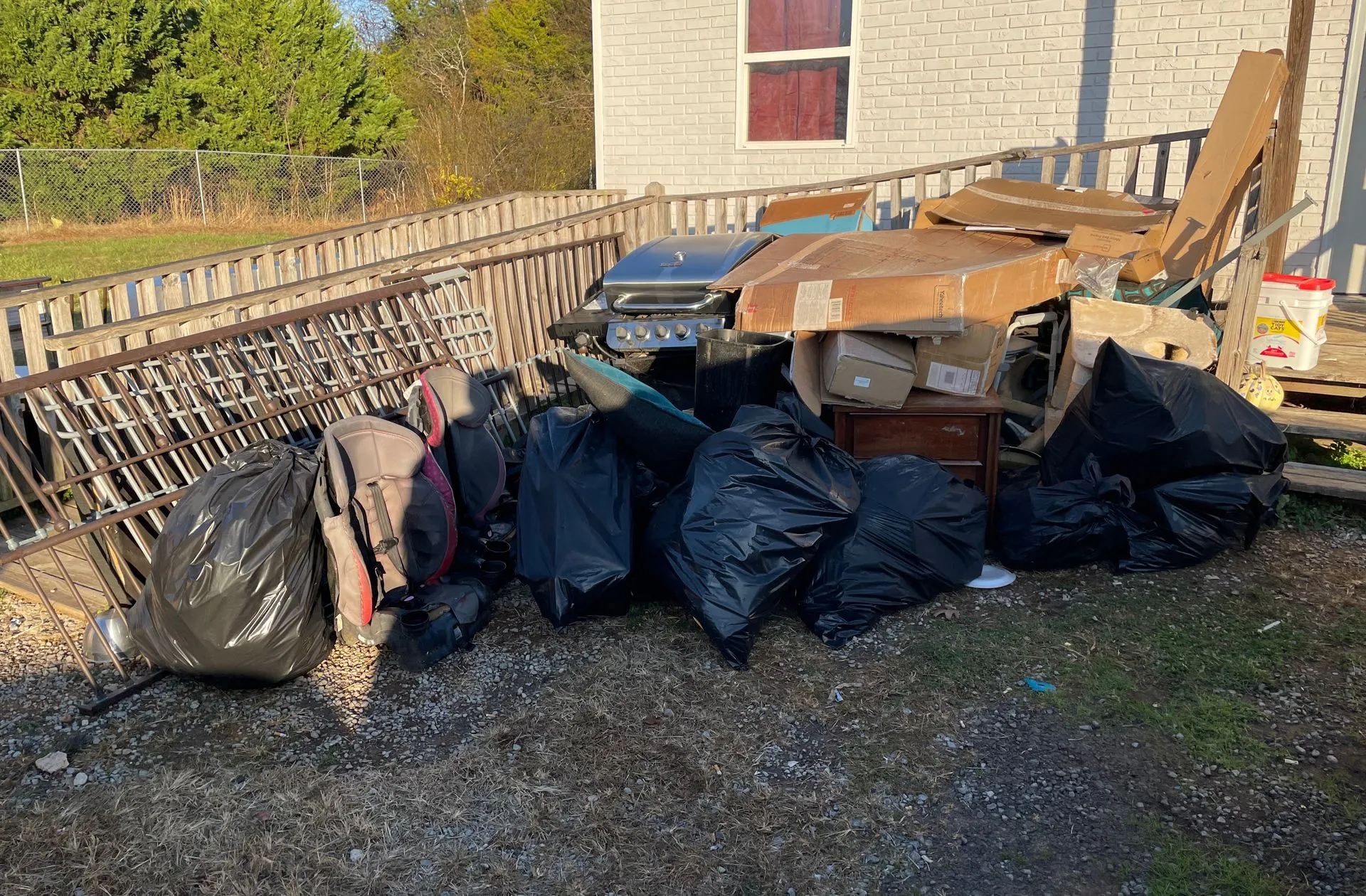 Piles of garbage and cardboard boxes