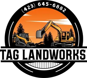 Excavators against sunset background