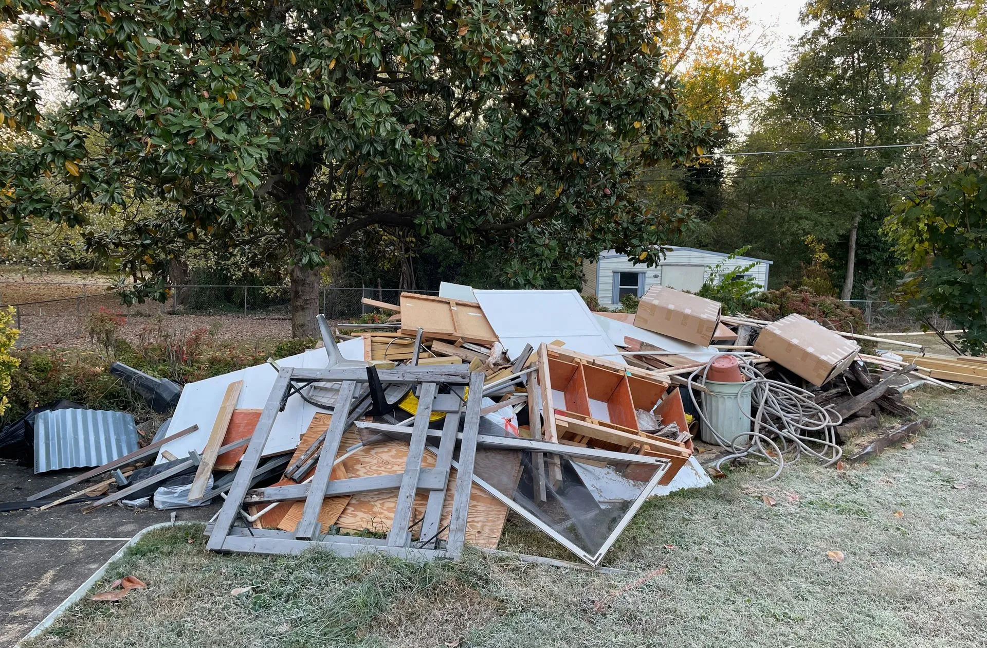Piled debris and construction materials outdoors