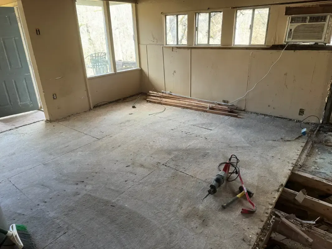 Room undergoing floor demolition process