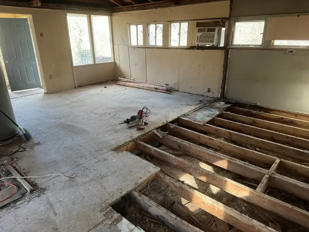 Floor demolition in unfinished room